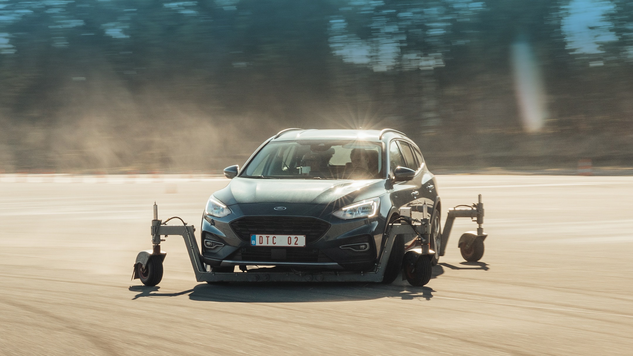 Man putting a bicycle into the trunk of the car