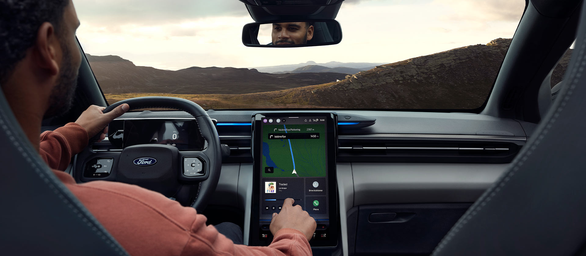 Ford EV interior showing advanced navigation tools for optimising EV range and planning trips.