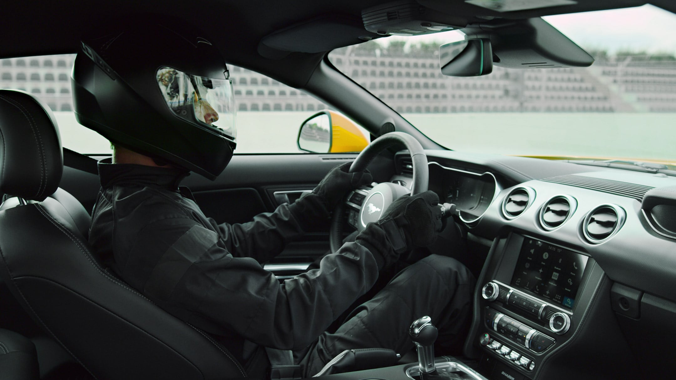 Ford Mustang interior view with racing driver