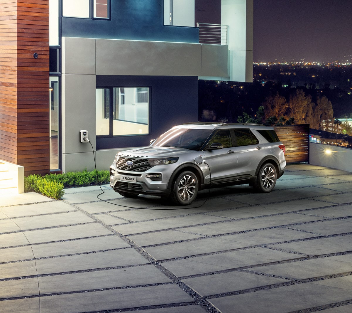 Ford Explorer PHEV parked up by the house