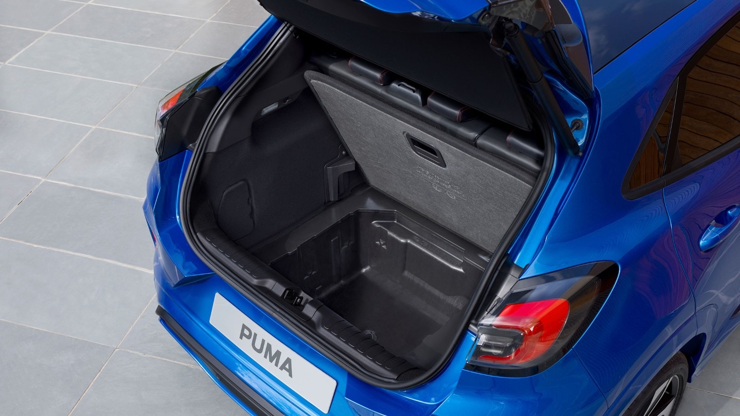 Blue Ford Puma rear view of open boot