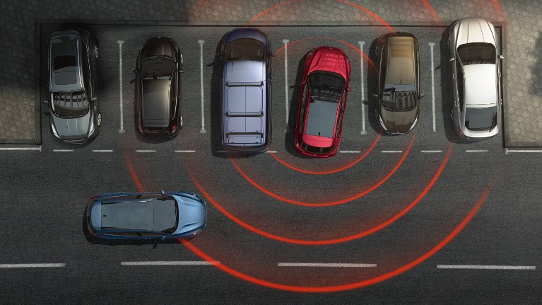 Ford Puma shown reversing from birds eye view with traffic alert on