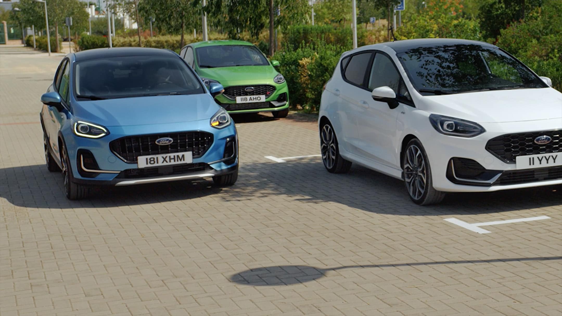 Three Ford Fiesta's in an outdoor location demonstrating the safety features