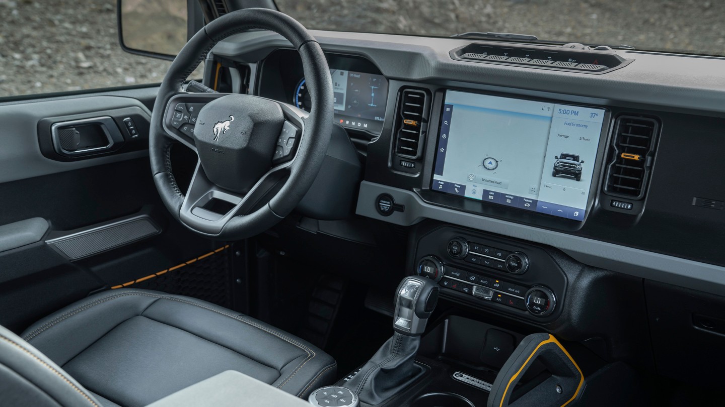 Ford Bronco interior design showing the steering wheel and the centre console with 12" touchscreen