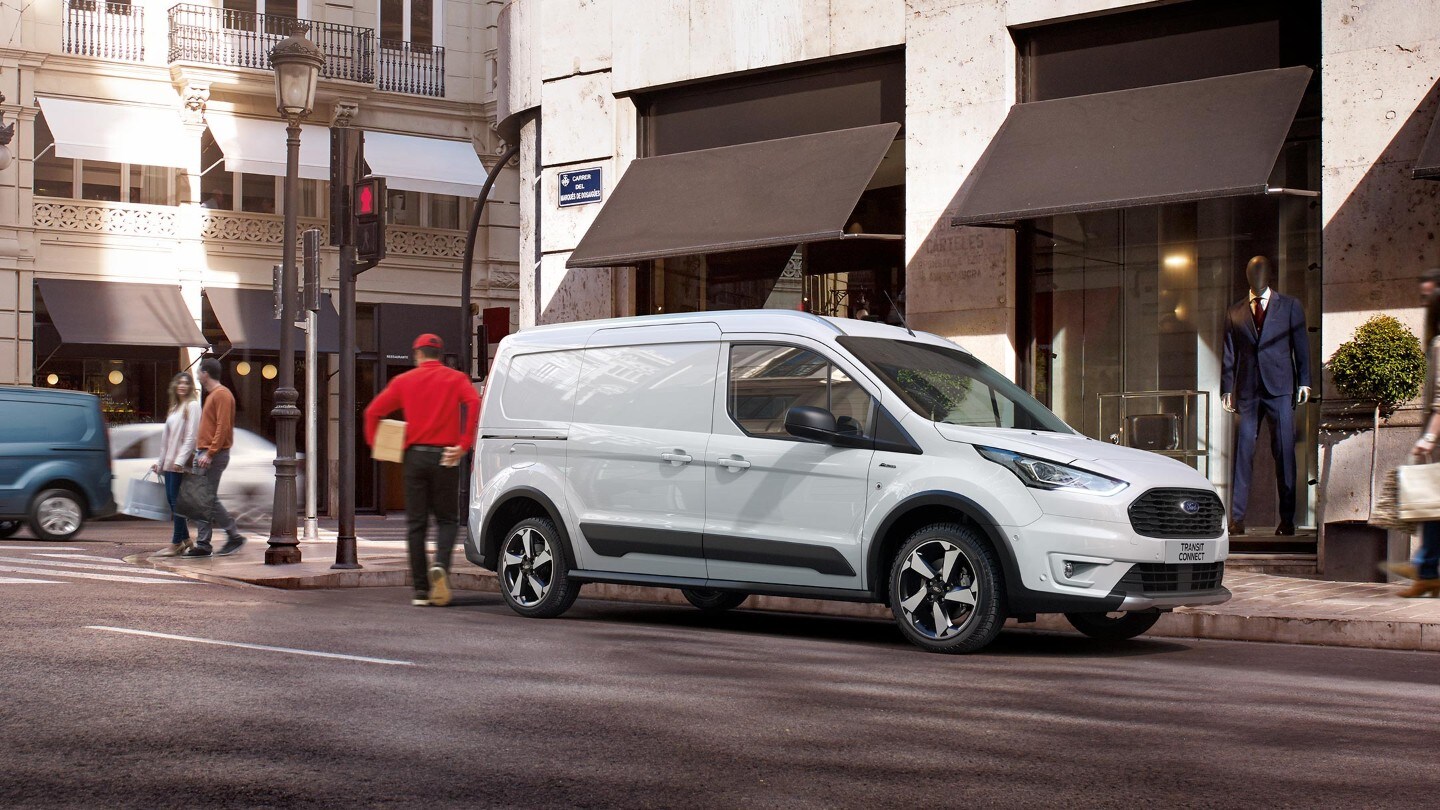 Ford Transit Connect Active parked with delivery man