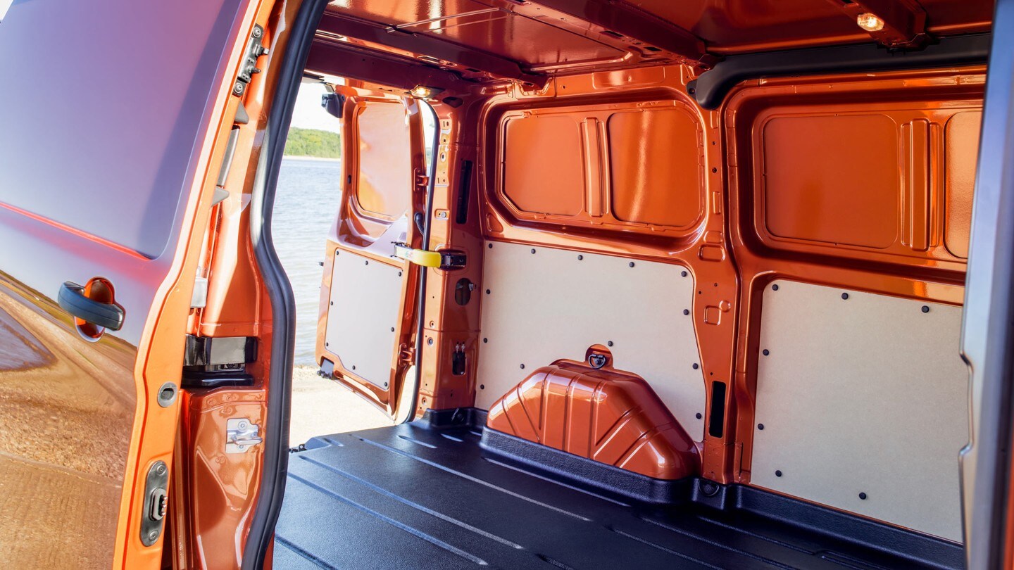 New Orange Ford Transit Custom open loadspace with side and rear doors