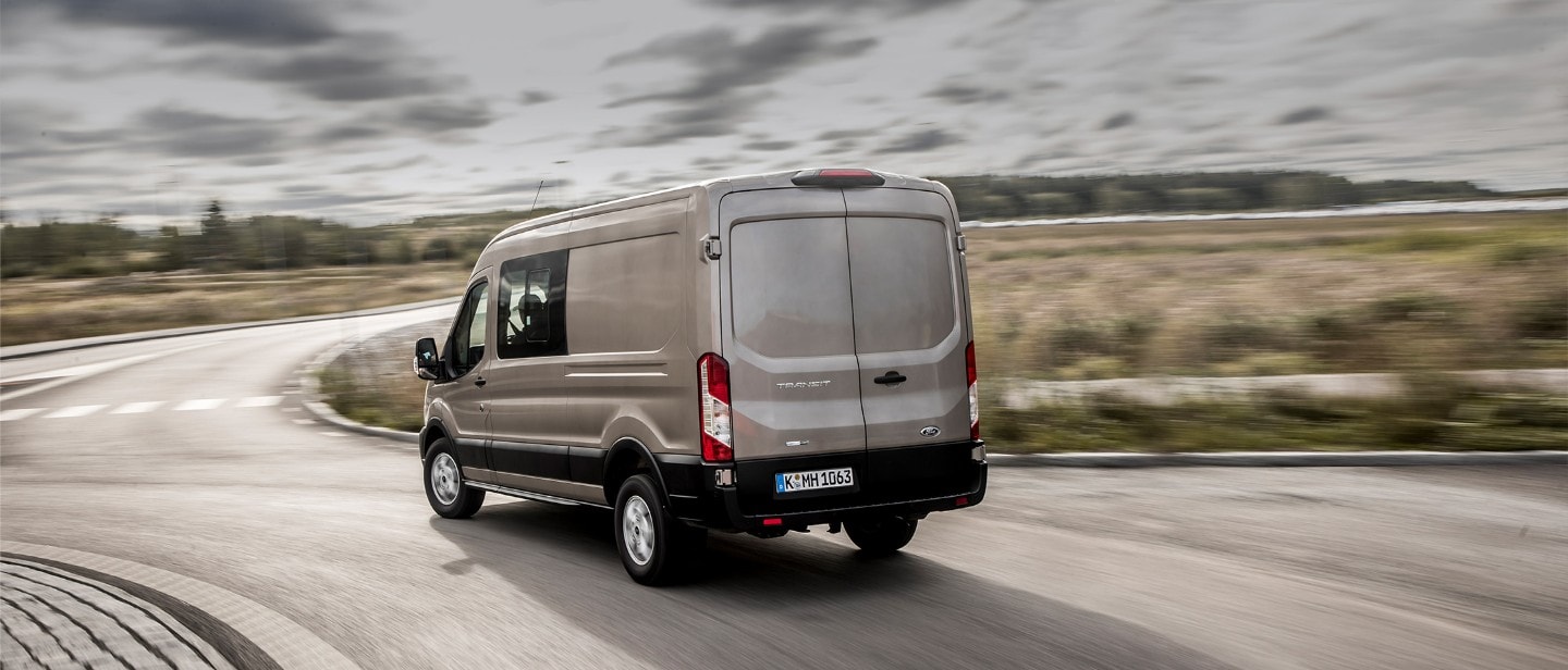 Ford Transit Van rear view on road