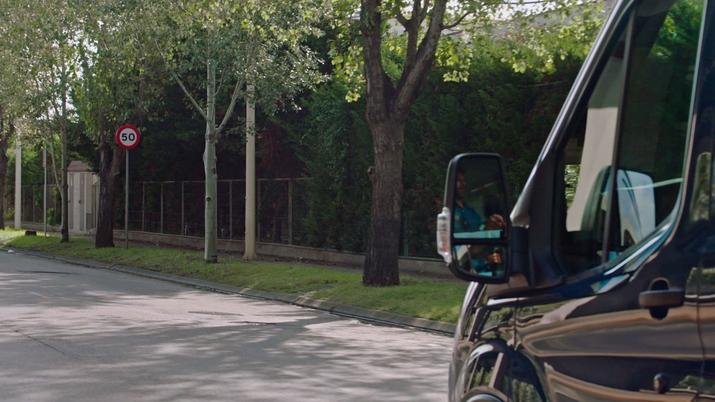 Ford Transit Van facing traffic sign 