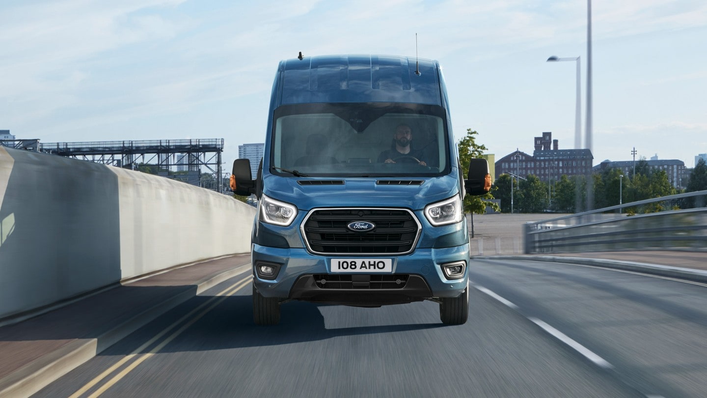 Ford Transit Van driving on highway front view