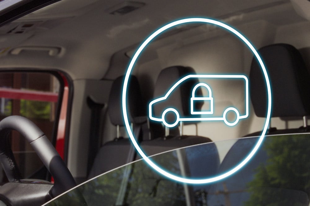 Vergrendelde bestelwagen-pictogram, weergegeven op de voorruit van een Ford E-Transit Custom.