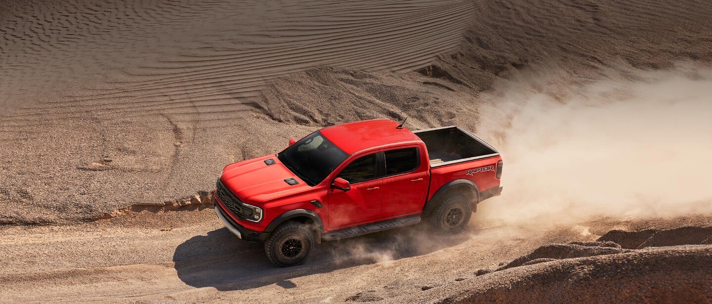 All-New Ford Ranger side view driving rocky terrain