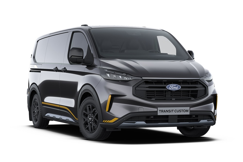 Donkergrijze Trail Ford Transit Custom bestelwagen met gouden accenten.