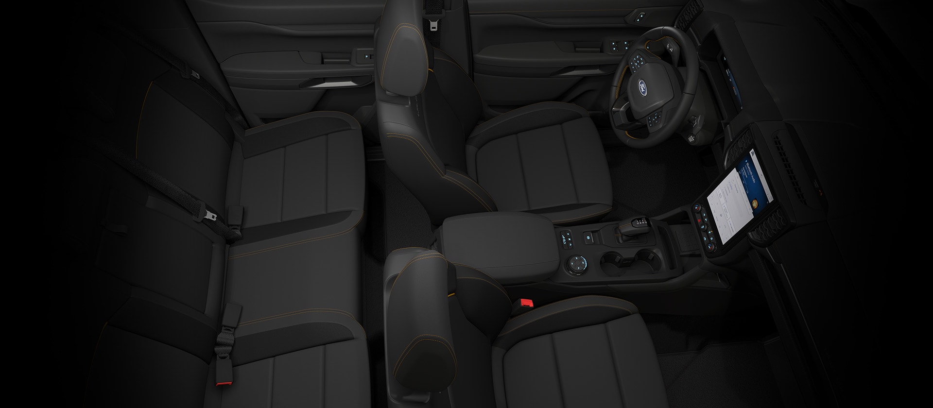 Bovenaanzicht van het interieur van een Ford Ranger Dubbele Cabine, met beeld van het dashboard.