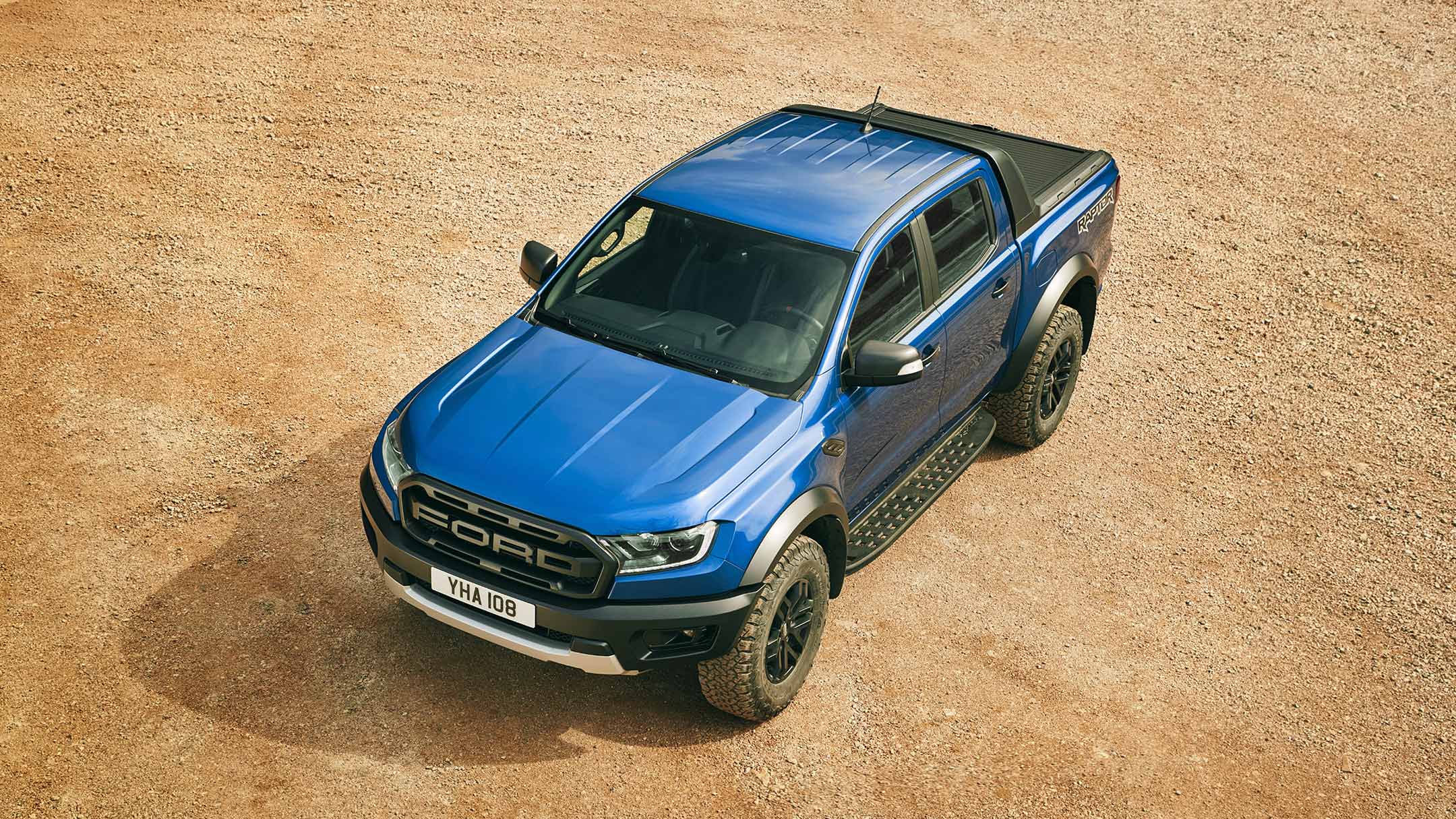 Blue Ford Ranger Raptor parked, birds eye view