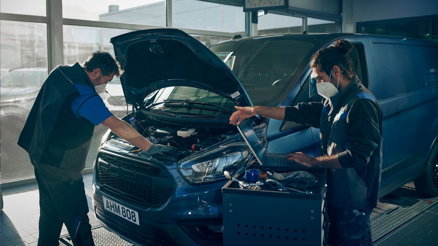 Ford mechanics doing an express service Ford mechanics doing an express service
