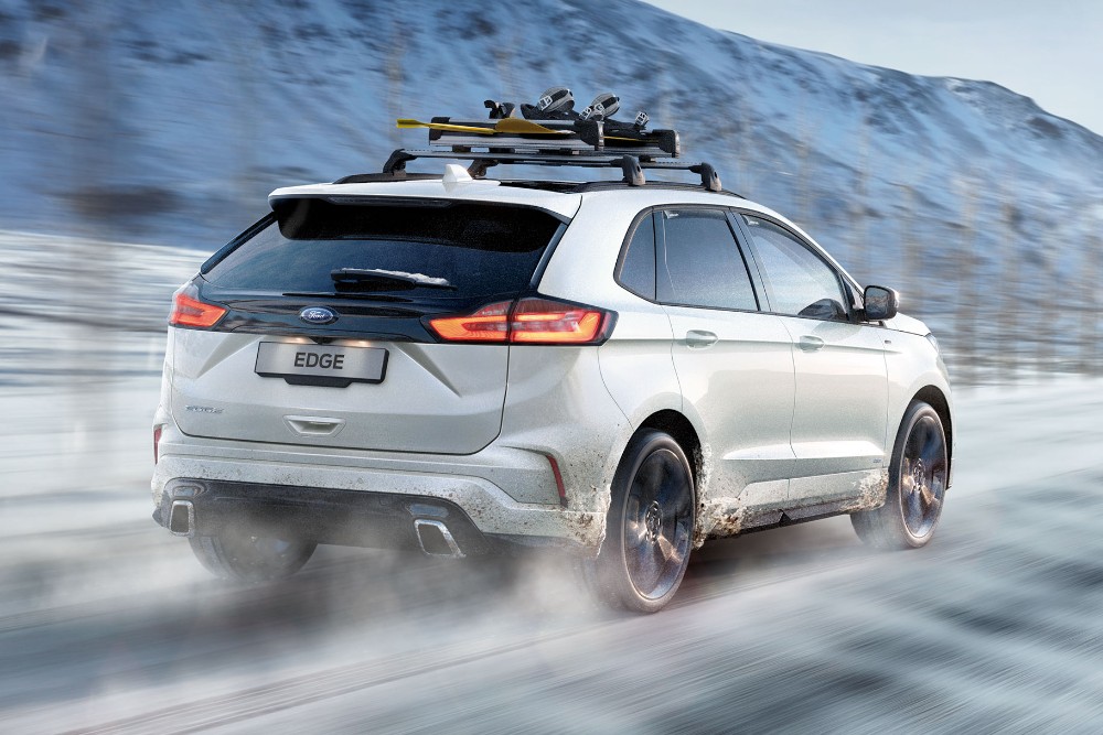 White Ford Edge, driving on icy roads